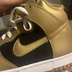Gold and Black Nike size 9